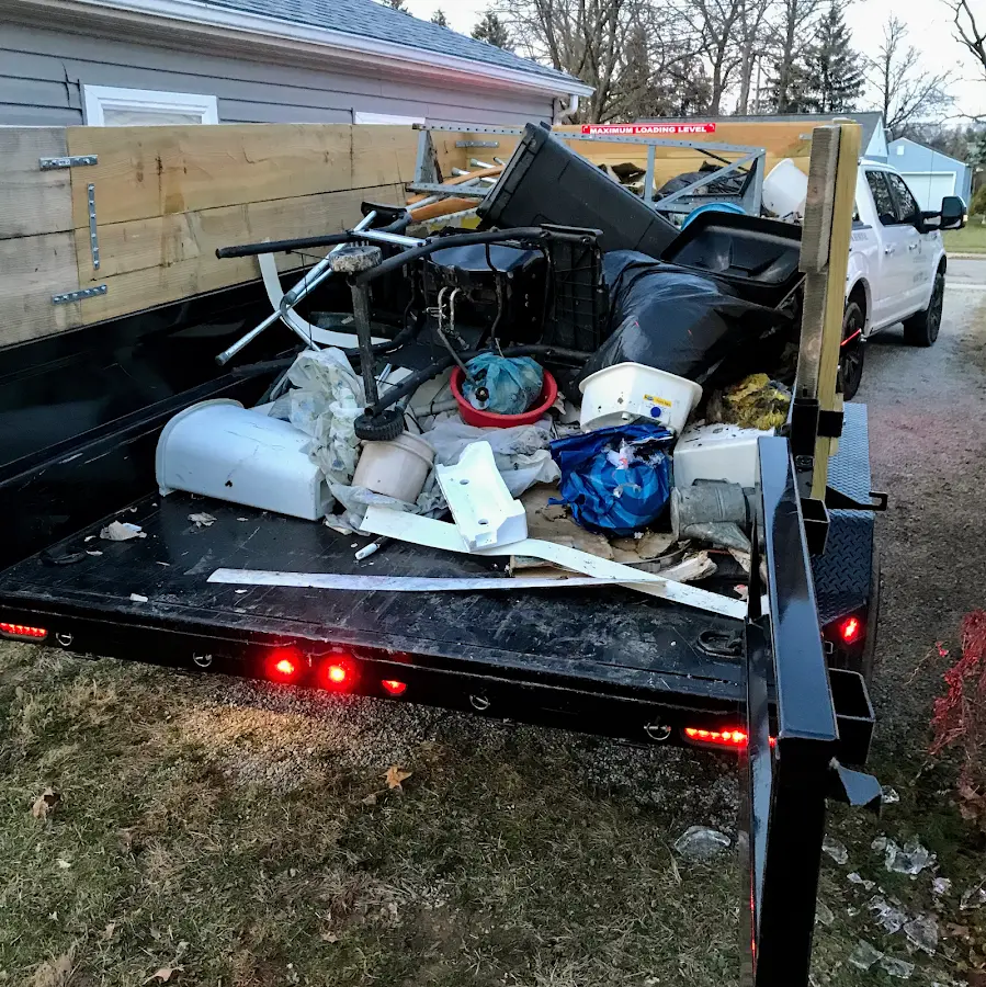 Roll-off dumpster delivered to a residential driveway in Ticonderoga