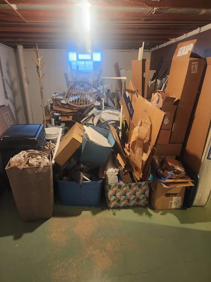 Roll-off dumpster container at job site for 4 Yard Dumpster Rental in Ticonderoga